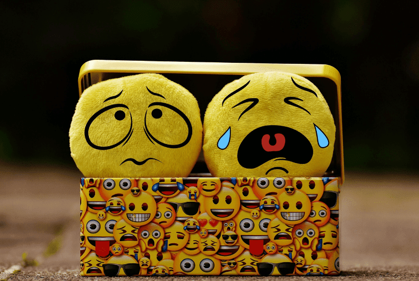mood tracker - moods are a lot more complex than one word or emoji.  Cute emoji plushies in a tin